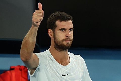 Russia's Karen Khachanov gives a thumbs up after winning the men's singles quarter-final match as USA's Sebastian Korda pulled out of the match due to injury on day nine of the Australian Open tennis tournament in Melbourne.