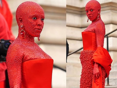Doja Cat covered in red paint & 30,000 crystals for Paris Fashion Week