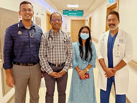 Sumi C. with the doctors who treated her at Aster Hospital, Qusais, in Dubai