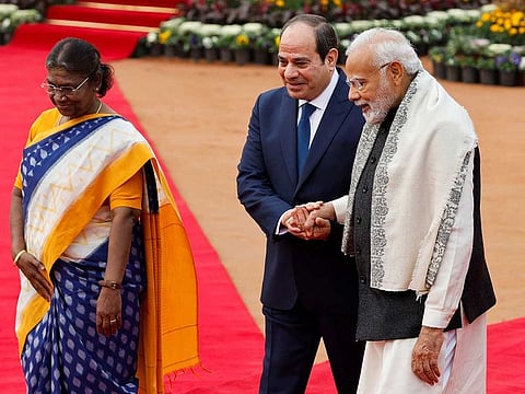 Indian President Droupadi Murmu, Egyptian President Abdel Fattah Al Sisi and Indian Prime Minister Narendra Modi walk during a ceremonial reception at the forecourt of India's Rashtrapati Bhavan Presidential Palace in New Delhi, India January 25, 2023.