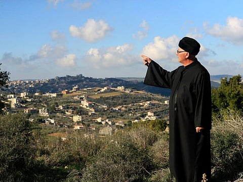 Najib Al Ameel stands on a hill overlooking his hometown Rmaych along the Lebanese-Israeli border. Green Without Borders that is active in southern Lebanon, including areas along the border with Israel, is being blamed by Israel, the US and some in Lebanon for being an arm for Hezbollah to cover some of the group's military activities.