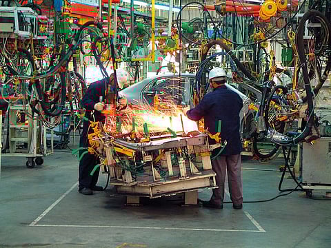 Workers at an automobile factory in India. The Make in India initiative is allowing more global corporations to increasingly view the country as a manufacturing hub