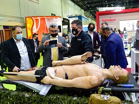 Visitors looking at medical equipments on display from Leader Healthcare on the opening day of Arab Health at Dubai World Trade Centre. Photo: Virendra Saklani/Gulf News
