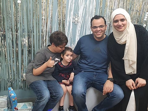 Lulu (second from left) with her brother Omar (left), father Samy Hasanin and mother Asmaa.