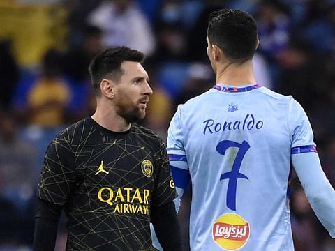 Lionel Messi (left) has been voted as the best footballer of 2022, but arch-rival Cristiano Ronaldo did not even make the top 50.