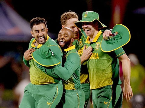 South African players celebrate with teammates after winning the first ODI against England at Mangaung Oval in Bloemfontein on January 27, 2023.