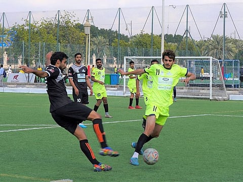 Football action from week three of the Sharjah Labour Sports Tournament.