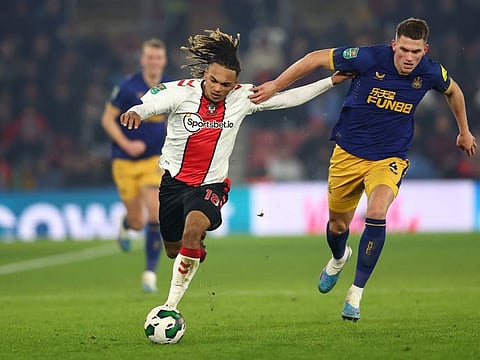 Southampton's Sekou Mara (left) in action with Newcastle United's Sven Botman during the EFL Cup semi-final first leg at St. Mary's stadium, Southampton. The teams will face off tomorrow in the second leg with Newcastle holding a 1-0 advantage.