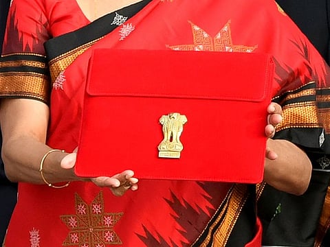 Union Finance Minister Nirmala Sitharaman shows the Budget tablet as she leaves from the Ministry of Finance to present and read out the Union Budget 2023 in the Parliament, at North Block, in New Delhi on Wednesday.