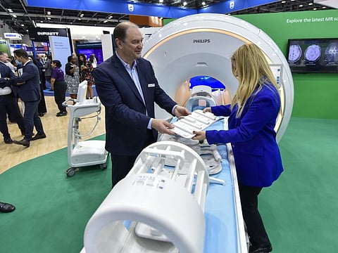 Edwin Paalvast (left), Chief of International Markets, Royal Philips at the Philips stand at Arab Health in Dubai
