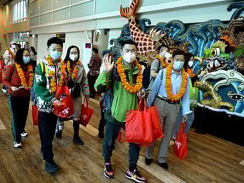 Chinese tourists arrived at Ngurah Rai InternationalÊAirport in Bali, Indonesia.