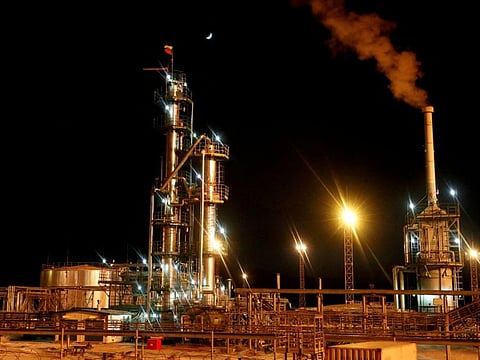 Futures for both grades climbed earlier in the session as record-low US unemployment figures spurred optimism that demand would hold up.