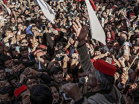 Activists of Awami National Party (ANP) gather during a peace rally following a mosque suicide blast inside police headquarters, in Peshawar on February 4, 2023.
