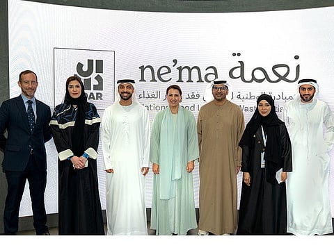 Representatives at the signing of the agreement between ne'ma and Aldar in Abu Dhabi, in the presence of Mariam Almheiri (centre), Minister of Climate Change and Environment