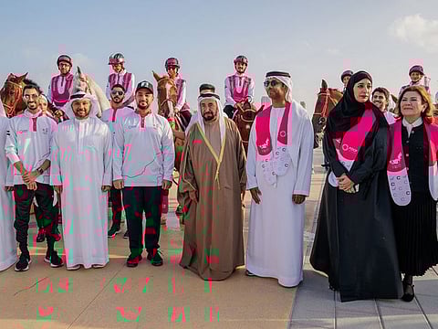 His Highness Dr Sheikh Sultan bin Muhammad Al Qasimi with the riders and officials