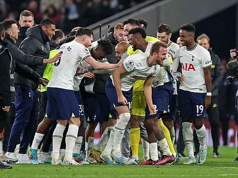 Tottenham Hotspur players celebrate with Harry Kane after he became Tottenham Hotspur's all-time top goalscorer.