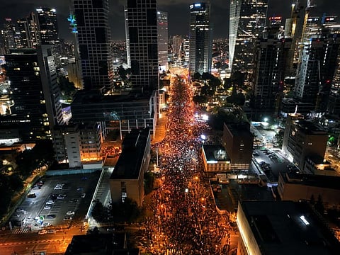 An aerial view shows Israelis during a demonstration against proposed judicial reforms by Israel's new right-wing government in Tel Aviv, Israel February 4, 2023. REUTERS/Oren Alon