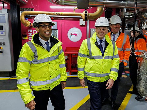 British Prime Minister Rishi Sunak and newly appointed Secretary of State for Energy Security and Net Zero, Grant Shapps are given a tour of a combined heat and power plant in Kings Cross, London.