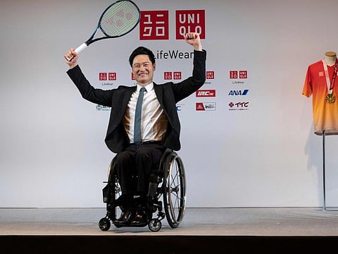 Wheelchair tennis great Shingo Kunieda of Japan poses following a press conference in Tokyo two weeks after announcing his retirement from the sport. The Japanese Paralympic legend said that he was ending his illustrious career satisfied that wheelchair tennis was now "finally seen as a sport" in the public's eyes.