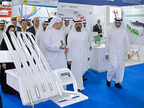 Sheikh Ahmed bin Saeed Al Maktoum, Chairman of Dubai Academic Health Corporation and Chancellor of the Mohammed Bin Rashid University of Medicine and Health Sciences, touring the exhibition