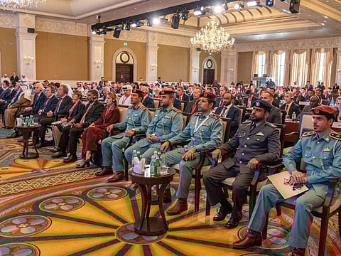 Officials hear a talk at the 24th Interpol Asian Regional Conference in Abu Dhabi on Tuesday