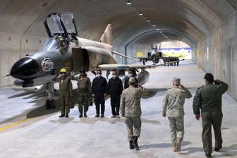 Iran's Army chief Major General Abdolrahim Mousavi and Iranian Armed Forces Chief of Staff, Major General Mohammad Bagheri visit the first underground air force base, called "Eagle 44" at an undisclosed location in Iran.