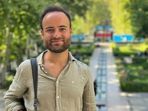 This undated handout photograph released on January 26, 2023 by his family shows Louis Arnaud, 35, who was arrested on September 28 as he was visiting Iran, his parents Jean-Michel and Sylvie said in a statement to AFP, as Paris says he and six other French citizens are being held as "hostages" by Iran.