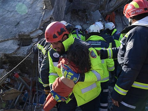 The Syrian family were rescued from the ruins of their fallen home.