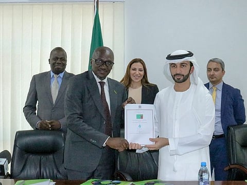 John Msimuko, Permanent Secretary, Ministry of Green Economy and Environment, Zambia, and Josiane Sadaka, CEO, Blue Carbon (second row); Eng. Collins Nzovu, Minister of Green Economy and Environment, Zambia, and Sheikh Ahmed Dalmook Al Maktoum, Chairman of Blue Carbon, during the signing of the agreement