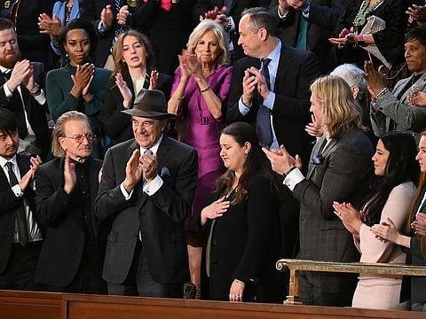 Attendees, including US First Lady Jill Biden, US Second Gentleman Doug Emhoff as US President Joe Biden delivers the State of the Union address in the House Chamber of the US Capitol in Washington, DC, on February 7, 2023.