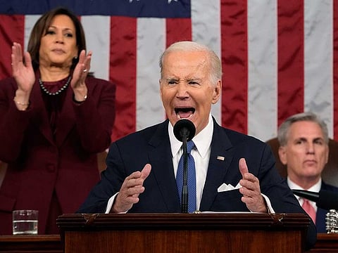 US President Joe Biden speaks during a State of the Union address at the US Capitol in Washington DC