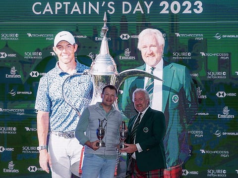 Half of the winning team: Dmitriy Korshunov (left) with EGC Captain Campbell Steedman at the prize presentation of Captain's Day