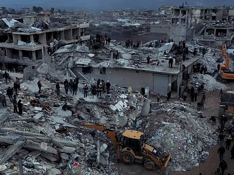 Damaged buildings and rescue operations are seen in the aftermath of the earthquake, in Aleppo.