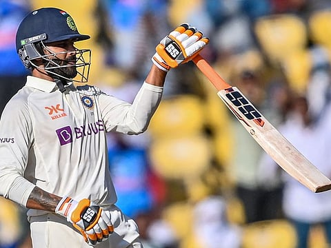 India's Ravindra Jadeja celebrates after scoring a half-century.