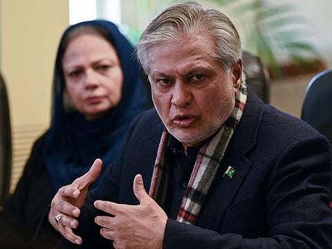 Pakistans Finance Minister Ishaq Dar speaks during a press conference in Islamabad on February 10, 2023.