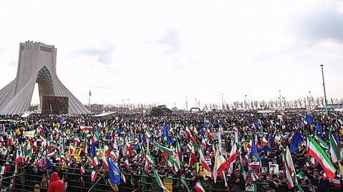 Many flag-waving people travelled on foot to converge on the capital’s iconic Azadi (Freedom) Square, despite chilly temperatures