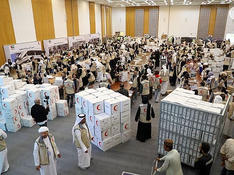 Hundreds of Emiratis and expats volunteers packing relief goods at the Abu Dhabi National Exhibition Centre on Saturday, for the quake-affected people in Syria and Turkey.
