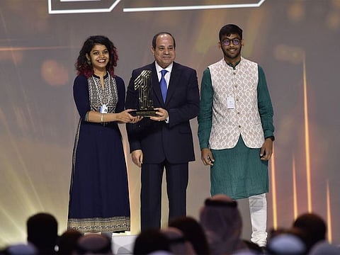 Niyati Totala and Neel Kalpeshkumar Parikh from The Indian Institute of Technology (IIT) Indore, India, receive the gold medal in the Global Best M-GOV Awards ceremony at WGS 2023 by Egyptian President Abdel Fattah Al-Sisi in Dubai on Monday