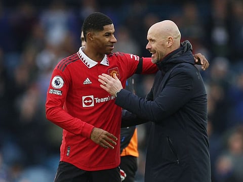 Manchester United's Marcus Rashford (left) and manager Erik ten Hag.