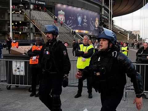 Police officers guard the Stade de France prior to the Champions League final between Liverpool and Real Madrid, in Saint Denis near Paris, last May. UEFA-appointed investigators have held European soccer's ruling body mostly responsible for chaotic security failures that put the lives of Liverpool and Real Madrid fans at risk, the investigation panel wrote in a 220-page document.