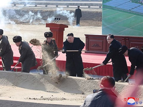 In this photo provided by the North Korean government, North Korean leader Kim Jong Un, centre, participates in groundbreaking ceremonies for new housing and farming projects in Pyongyang, North Korea Wednesday, Feb. 15, 2023.
