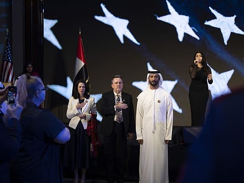 Meghan Gregonis, Sean Murphy, Abdulla Bin Touq Al Marr at the US Independence Day celebrations in Dubai on Thursday.