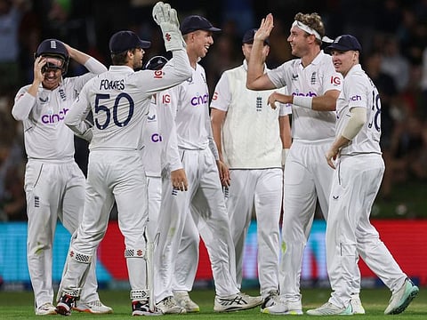 England's Stuart Broad (second right) celebrates with his teammates after bowling New Zealand's Tom Blundell during day three of the first cricket Test at Bay Oval in Mount Maunganui.