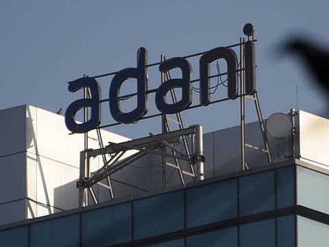 Adani Group said it has adequate cash reserves and its listed companies are able to refinance their debts, in a credit report aimed at reassuring investors after a critical investigation by US short-seller Hindenburg Research last month.
