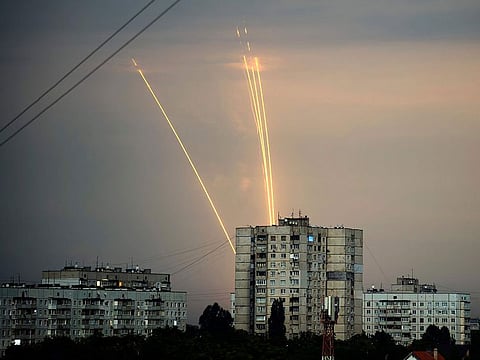Russian rockets launched against Ukraine from Russia's Belgorod region are pictured at dawn in Kharkiv, Ukraine.