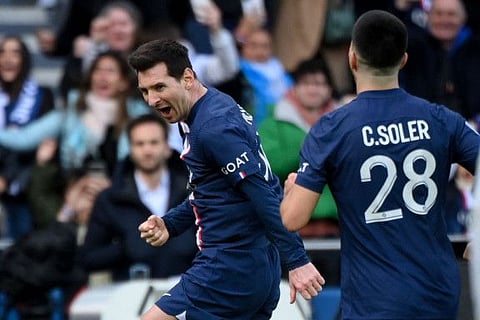 Paris Saint-Germain's Argentine forward Lionel Messi reacts after scoring his team's fourth goal during the French L1 match against Lille LOSC at The Parc des Princes Stadium in Paris.