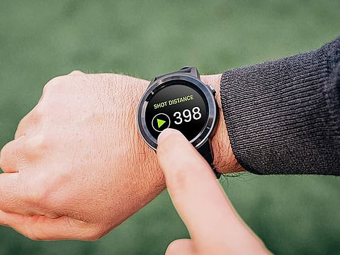 Use a golf watch, a rangefinder tool strapped to the wrist, to crunch the distances for you, no matter what the course.