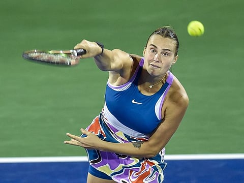 Aryna Sabalenka sends down a serve against Jelena Ostapenko in round 16 of the Dubai Tennis Championships on Wednesday.