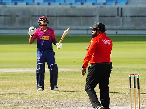 Aayan Khan celebrates after guiding UAE to victory over Namibia during the ICC Men's Cricket World Cup League 2 match on Thursday.