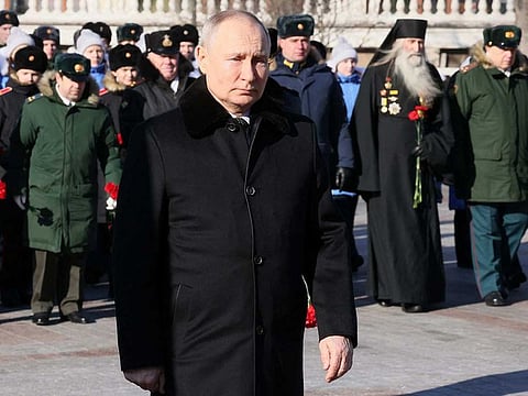 Russian President Vladimir Putin attends a wreath laying ceremony at the Tomb of the Unknown Soldier by the Kremlin Wall on the Defender of the Fatherland Day in Moscow, Russia, February 23, 2023.